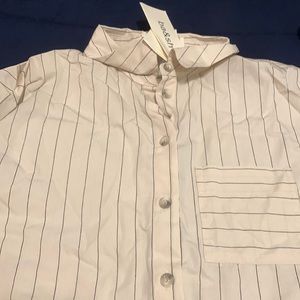 Nice special occasion blouse cream colored with strips and buttons